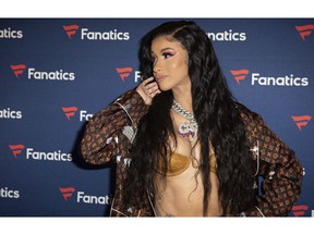 FILE - This Feb. 2, 2019 file photo, Cardi B arrives at the 2019 Fanatics Super Bowl Party in Atlanta.  Even though Cardi B has a strong chance of winning her first-ever Grammy, the rapper says she is feeling nervous heading into the upcoming awards show.