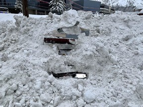 This Feb. 17, 2019 photo provided by City of South Lake Tahoe shows a car buried in snow in South Lake Tahoe, Calif.    Authorities say a snowplow operator inadvertently bumped into a car buried in snow and found a woman unharmed inside.