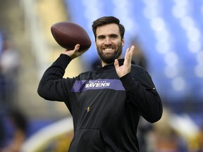 FILE - In this Dec. 30, 2018, file photo, Baltimore Ravens quarterback Joe Flacco warms up before an NFL football game against the Cleveland Browns, in Baltimore. A person with knowledge of the trade tells The Associated Press, Wednesday, Feb. 13, 2019, that the Denver Broncos have agreed to acquire Baltimore Ravens quarterback Joe Flacco in exchange for a fourth-round pick in this year's NFL draft. The person spoke on condition of anonymity because neither team announced the deal. NFL rules prohibit teams from discussing such trades until the start of the league year on March 13. Flacco became expendable in Baltimore with the emergence of rookie Lamar Jackson.