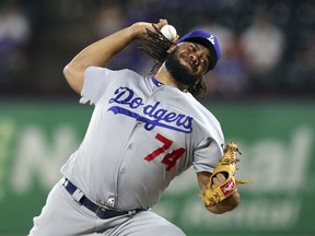 FILE - In this Aug. 28, 2018, file photo, Los Angeles Dodgers relief pitcher Kenley Jansen (74) delivers a pitch in the ninth inning a baseball game against the Texas Rangers, in Arlington, Texas. Jansen remains one of the best closers in the game.