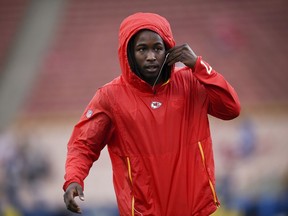 FILE - In this Nov. 19, 2018, file photo, Kansas City Chiefs running back Kareem Hunt warms up before an NFL football game against the Los Angeles Rams, in Los Angeles. The Cleveland Browns have signed Kareem Hunt, the running back cut by Kansas City in November after a video showed him pushing and kicking a woman the previous February.  Cleveland general manager John Dorsey, who drafted Hunt while working for Kansas City, on Monday, Feb. 11, 2019,  said the Browns "fully understand and respect the complexity of questions and issues in signing a player with Kareem's history and do not condone his actions."