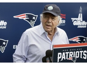 FILE - In this June 7, 2018, file photo, New England Patriots owner Robert Kraft speaks with reporters following an NFL football minicamp practice, in Foxborough, Mass. Police in Florida have charged New England Patriots owner Robert Kraft with misdemeanor solicitation of prostitution, saying they have videotape of him paying for a sex act inside an illicit massage parlor.  Jupiter police told reporters Friday, Feb. 22, 2019, that the 77-year-old Kraft has not been arrested.