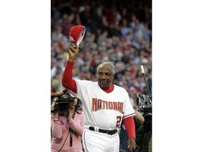 FILE - In this April 14, 2005, file photo, Washington Nationals manager Frank Robinson tips his hat to the crowd as he is introduced during their home opener against the Arizona Diamondbacks, at RFK Stadium in Washington. Hall of Famer Frank Robinson, the first black manager in Major League Baseball and the only player to win the MVP award in both leagues, has died. He was 83. Robinson had been in hospice care at his home in Bel Air. MLB confirmed his death Thursday, Feb. 7, 2019.