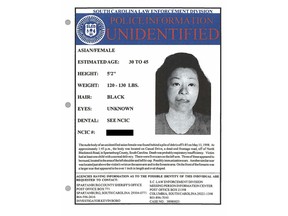Myoung Hwa Cho is shown on a poster provided by the Spartanburg County, South Carolina, Sheriff's Office. More than 20 years after the bodies of Myoung Hwa Cho, and a 10-year-old boy were found 215 miles apart in separate states beside Interstate 85, investigators now say they were a mother and son and the boy's father has confessed to killing them.  (Spartanburg County, South Carolina, Sheriff's Office via AP)