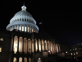 FILE- In this Feb. 5, 2019, file photo lights illuminate the U.S. Capitol dome in Washington. On Thursday, Feb. 14, the Labor Department reports on the number of people who applied for unemployment benefits last week.