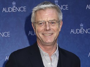 FILE - In this March 8, 2015, file photo, director Stephen Daldry attends the Broadway opening night of "The Audience" at The Gerald Schoenfeld Theatre in New York. Universal Pictures said Friday, Feb. 8, 2019, that the long-awaited movie version of the hit musical "Wicked" will land in theaters on Dec. 22, 2021. It had originally been on the schedule for this December. Stephen Daldry is still set to direct the film, with Marc Platt producing. The musical is a reimagining of "The Wizard of Oz" told from the perspective of the witches.