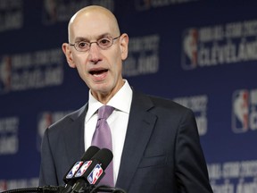 FILE - In this Nov. 1, 2018 file photo, NBA Commissioner Adam Silver announces that the Cleveland Cavaliers will host the 2022 NBA All Star game during a news conference in Cleveland. The NBA is bringing a pro league to Africa. The Basketball Africa League, a new collaboration between the NBA and the sport's global governing body FIBA, was announced Saturday, Feb. 16, 2019.