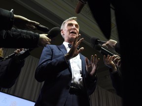 In this March 6, 2018 file photo, Bill Nye speaks to reporters after participating in a panel discussion with Prime Minister Justin Trudeau at the University of Ottawa.