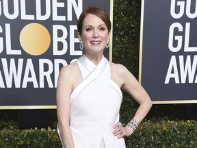 FILE - In this Jan. 6, 2019 file photo, Julianne Moore arrives at the 76th annual Golden Globe Awards in Beverly Hills, Calif. Moore has helped New York Gov. Andrew Cuomo's administration unveil the governor's series of initiatives aimed at improving the lives of women in New York. Cuomo's list of proposals for 2019 includes eliminating the statute of limitations for rape claims and increasing protections against sexual harassment in the workplace.