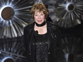 FILE - This Feb. 22, 2015, file photo shows Shirley MacLaine at the Oscars in Los Angeles. MacLaine was honored for career achievement by the AARP, the organization for retired persons and its AARP, The Magazine. The awards show will be broadcast Feb. 15, 2019, on PBS.