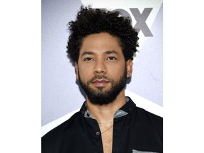 FILE - In this May 14, 2018 file photo, Jussie Smollett, a cast member in the TV series "Empire," attends the Fox Networks Group 2018 programming presentation afterparty in New York. A police official says "Empire" actor is now considered a suspect "for filing a false police report" and that detectives are presenting the case against him to a grand jury. Smollett told police he was attacked by two masked men while walking home from a Subway sandwich shop at around 2 a.m. on Jan. 29. He says they beat him, hurled racist and homophobic insults at him and looped a rope around his neck before fleeing.