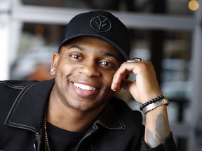 In this Jan. 22, 2019, photo, country singer Jimmie Allen poses in Nashville, Tenn.  Allen is the first black artist to launch his career with a No. 1 single on the Billboard Country Airplay chart.