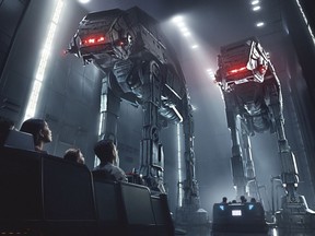 This rendering released by Disney and Lucasfilm shows people on the planned Star Wars: Rise of the Resistance attraction, part of   Star Wars: Galaxy's Edge. The 14-acre area set to open this summer at the Disneyland Resort in Anaheim, California, then in the fall at Disney's Hollywood Studios in Orlando, Florida. (Disney Parks/Lucasfilm via AP)