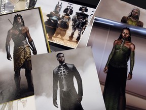This Jan. 15, 2019 photo shows renderings of fashions created by Oscar nominated costume designer Ruth E. Carter for the film "Black Panther," in Los Angeles. Carter will also be honored for her illustrious career at the 21st annual Costume Designers Guild Awards on Tuesday in Beverly Hills, Calif.