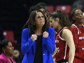 FILE - In this Dec. 31, 2018, file photo, Rutgers head coach C. Vivian Stringer reacts in the final minutes of an NCAA college basketball game against Maryland in Baltimore. Rutgers won, 73-65. Coach Stringer, who earlier this season posted her 1,000th victory, is taking off the rest of the regular season on the advice of doctors. The announcement Sunday, Feb. 24, 2019, by the Big Ten Conference school came three days after the 70-year-old Hall of Famer missed a game at Michigan.