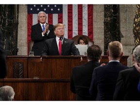 President Donald Trump gives his State of the Union address to a joint session of Congress, Tuesday, Feb. 5, 2019 at the Capitol in Washington, as Vice President Mike Pence, left, and House Speaker Nancy Pelosi look on.
