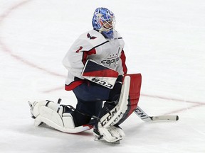 FILE - In this Nov. 13, 2018 file photo Washington Capitals goalie Pheonix Copley plays against the Minnesota Wild in an NHL hockey game in St. Paul, Minn. The Capitals have signed Copley to a $3.3 million, three-year extension. Copley will count $1.1 million against the salary cap in each of the next three seasons. General manager Brian MacLellan announced the contract Monday, Feb. 4, 2019 while the team was on the ice for practice.