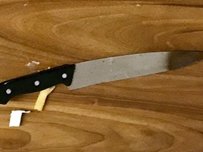 This photo, provided by the New York City Police Department, Friday, Feb. 8, 2019, shows a butcher knife that police say was used in an attack. New York police on Friday fatally shot the man they say was attacking his domestic partner with the butcher knife. (New York City Police Department via AP)