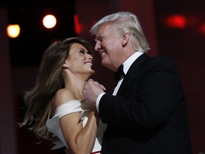 FILE- In this Jan. 20, 2017 file photo, President Donald Trump dances with first lady Melania Trump at the Liberty Ball in Washington after his Inauguration ceremony. On Wednesday, Feb. 27, 2019, a spokesman for President Donald Trump's inaugural committee has confirmed that the committee has been subpoenaed for financial records by the attorney general for the District of Columbia. The subpoena requests documents regarding the $107 million the committee raised to hold inaugural events.