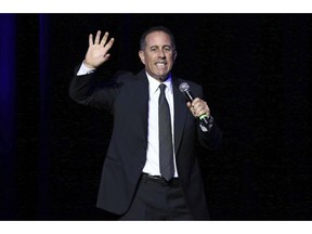 FILE - In this Nov. 1, 2016 file photo, Jerry Seinfeld performs at Stand Up For Heroes, at The Theater in New York's Madison Square Garden. Seinfeld is suing a California dealer in classic cars, saying the company has left him stranded in a dispute over whether a 1958 Porsche he sold is authentic. The suit comes weeks after Seinfeld was sued by a company that says it bought the comedian's Porsche for $1.5 million only to learn it was fake.