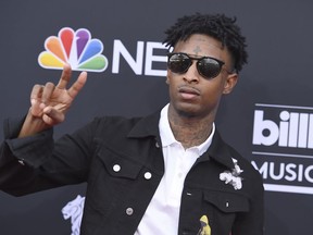 FILE - In this Sunday, May 20, 2018, file photo, 21 Savage arrives at the Billboard Music Awards at the MGM Grand Garden Arena in Las Vegas. It was a shock for fans when 21 Savage was taken into custody Sunday, Feb. 3, 2019, by U.S. immigration agents in Georgia. It was an even bigger shock to learn he had been an immigrant in the first place.