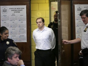 James Jackson appears in court for sentencing in New York, Wednesday, Feb. 13, 2019. Jackson, a white supremacist, pled guilty to killing a black man with a sword as part of a racist plot that prosecutors described as a hate crime and was sentenced to life in prison without parole.