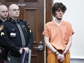 Suspect Wade Edward Winn, right, appears before Judge Kevin T. Miles at Clermont County Municipal Court into the shooting incident involving two officers of the Clermont County Sheriff's Office, Monday, Feb. 4, 2019, in Batavia, Ohio. Detective Bill Brewer died from gunshot wounds after being transported to Anderson Mercy Hospital.