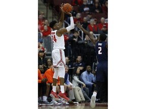 Ohio State forward Andre Wesson goes up for a shot against Illinois forward Kipper Nichols during the first half of an NCAA college basketball game in Columbus, Ohio, Thursday, Feb. 14, 2019.