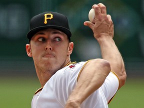 FILE - In this May 16, 2018, file photo, Pittsburgh Pirates starting pitcher Jameson Taillon delivers in the first inning of a baseball game against the Chicago White Sox in Pittsburgh. The Pirates believe their young core of starting pitching, fronted by Taillon and Tevor Williams, that seemed to get better as 2018 wore on, are ready for another massive step forward in 2019.