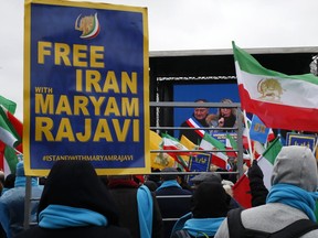 Supporters of Maryam Rajavi, the leader of the National Council of Resistance of Iran, gather during a rally in Paris, Friday Feb.8, 2019 as Iran marks the 40th anniversary of its Islamic Revolution.