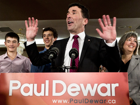 Paul Dewar, surrounded by sons Nathaniel and Jordan, and wife Julie Sneyd, announces his candidacy for the federal NDP leadership in October 2011.