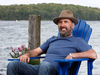 Former MP Paul Dewar relaxes at his family cottage on Big Rideau Lake, Aug 18, 2018.