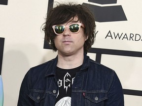 FILE - In this Feb. 8, 2015 file photo, Ryan Adams arrives at the 57th annual Grammy Awards in Los Angeles.