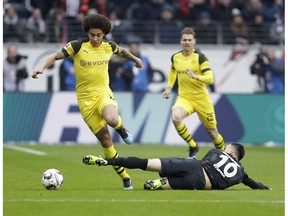 Frankfurt's Filip Kostic, right, and Dortmund's Axel Witsel challenge for the ball during a German Bundesliga soccer match between Eintracht Frankfurt and Borussia Dortmund in Frankfurt, Germany, Saturday, Feb. 2, 2019.