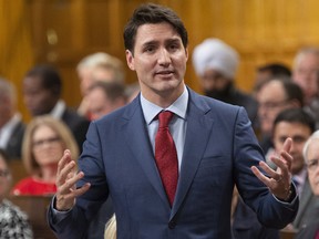 Prime Minister Justin Trudeau speaks about the House of Commons following Question Period Wednesday December 12, 2018 in Ottawa.