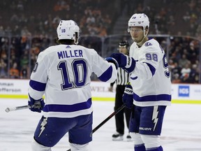 Tampa Bay Lightning's Mikhail Sergachev, right, and J.T. Miller celebrate Sergachev's goal during the first period of an NHL hockey game against the Philadelphia Flyers, Tuesday, Feb. 19, 2019, in Philadelphia.