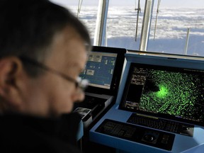 In this July 16, 2017, file photo a radar shows sea ice ahead of the Finnish icebreaker MSV Nordica as chief officer Harri Venalainen navigates the ship through the Beaufort Sea while traversing the Arctic's Northwest Passage