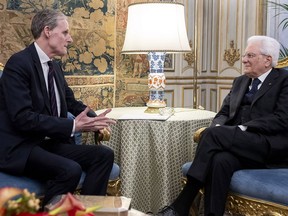 Italian President Sergio Mattarella, right, meets France's Ambassador Christian Masset, in Rome, Friday, Feb. 15, 2019. France sent its ambassador back to Italy following the biggest diplomatic dispute between the two countries since World War II.