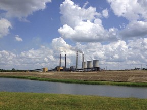 FILE - This June 3, 2014, file photo shows a panoramic view of the Paradise Fossil Plant in Drakesboro Ky. President Donald Trump's vow to save the coal industry will be tested this week when a utility board he appoints weighs whether to close a coal-fired power plant in Kentucky whose suppliers include a mine owned by one of his campaign donors. An environmental assessment by the Tennessee Valley Authority recommends shuttering the remaining coal-fired unit at the Paradise Fossil Plant in Muhlenberg County. The board could vote on Thursday, Feb. 14, 2019.