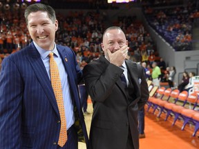 Clemson's head coach Brad Brownell, left, shares a laugh with Virginia Tech head coach Buzz Williams before the first half of an NCAA college basketball game Saturday, Feb. 9, 2019, in Clemson, S.C..