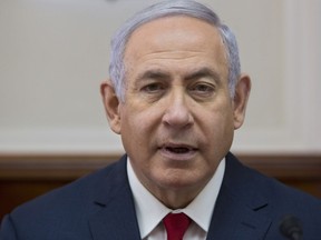 Israeli Prime Minister Benjamin Netanyahu chairs the weekly cabinet meeting at the Prime Minister's office in Jerusalem, Sunday, Feb. 17, 2019.