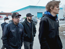 Workers are escorted from the property after a mass shooting the Henry Pratt Co.  on Feb. 15, 2019 in Aurora, Illinois.