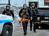 Law enforcement officers at the scene of a mass shooting at the Henry Pratt Co. on Feb. 15, 2019, in Aurora, Illinois.