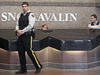 RCMP officers guard the lobby of the SNC-Lavalin head office in Montreal as a raid is carried out at the company on April 13, 2012.