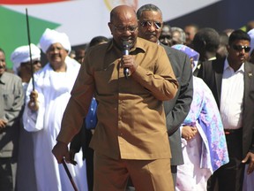 FILE - In this Jan. 9, 2019 file photo, Sudan's President Omar al-Bashir addresses supporters at a rally in Khartoum, Sudan. On Tuesday, Feb 12, 2019, hundreds of demonstrators are gathering in different Sudanese cities, protesting against autocratic al-Bashir. The demonstrations, were called by the Sudanese Professionals Association, an umbrella of independent professional unions. Video footage shows demonstrators gathering at intersections chanting "just fall," and calling for a "people's revolution."