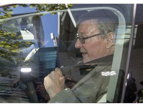 In this Friday, Feb. 22, 2019, photo, Cardinal George Pell leaves the County Court in Melbourne, Australia. The most senior Catholic cleric ever charged with child sex abuse has been convicted Tuesday, Feb. 26, 2019 of molesting two choirboys moments after celebrating Mass, dealing a new blow to the Catholic hierarchy's credibility after a year of global revelations of abuse and cover-up.