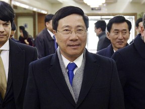 Vietnamese Foreign Minister Pham Binh Minh arrives at Pyongyang International Airport in Pyongyang, North Korea, Tuesday, Feb. 12, 2019. Pham visited Pyongyang for meetings ahead of the next summit between U.S. President Donald Trump and North Korean leader Kim Jong Un scheduled for Feb. 27-28.
