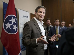 FILE - In this Feb. 1, 2019 file photo, Gov. Bill Lee answers questions from the media during a visit to Gestamp Inc., in Chattanooga, Tenn. Lee raised almost $2.5 million and spent nearly $1.8 million for his inauguration. The list of hundreds of donors from the Republican's inaugural disclosures includes prominent politicians, Lee administration figures, top companies, political action committees and more. Lee finished with more than $441,000 left in his inaugural fund.