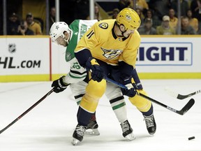 Nashville Predators center Brian Boyle (11) battles Dallas Stars center Jason Dickinson (16) for the puck in the first period of an NHL hockey game Thursday, Feb. 7, 2019, in Nashville, Tenn. Boyle was acquired by Nashville from the New Jersey Devils for a second-round draft pick.