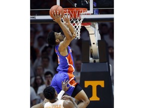 Florida guard Jalen Hudson (3) attempts a dunk during the first half of an NCAA college basketball game against Tennessee, Saturday, Feb. 9, 2019, in Knoxville, Tenn.